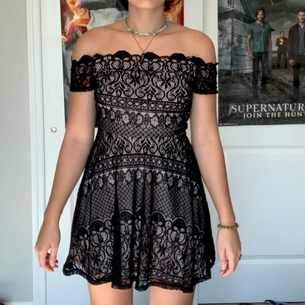 Off the shoulder black lace dress